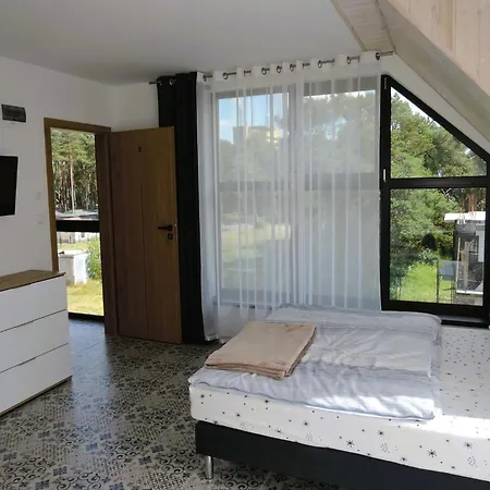 In By Sandy Beaches Apartman