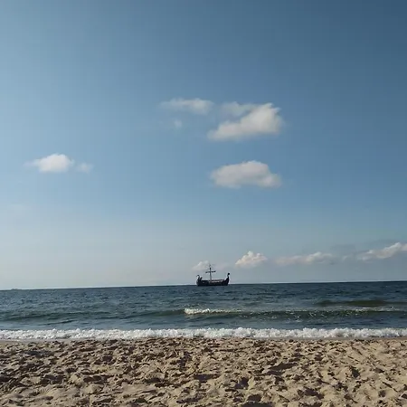 In By Sandy Beaches Apartman