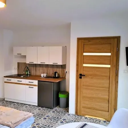 In By Sandy Beaches Apartman